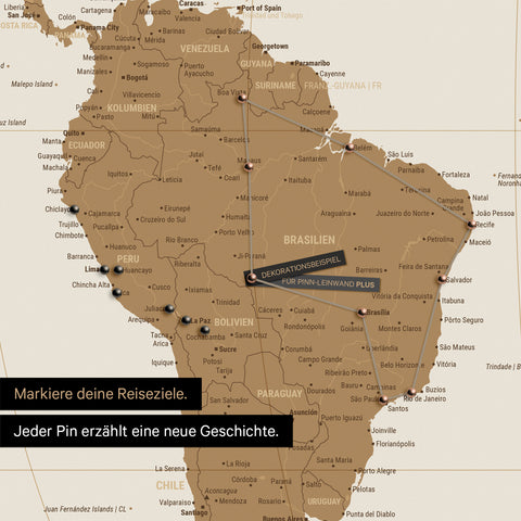 Detail of a world map in the Equal Earth projection as a bronze Push Pin Map, showing a pinned travel route through the South American countries of Brazil, Peru, and Ecuador