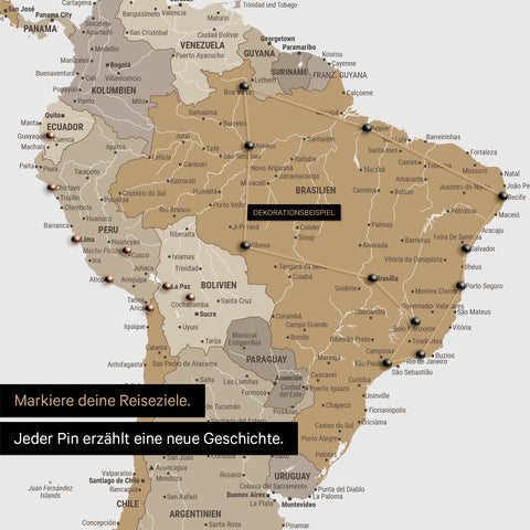 Detail of a push pin world map in Multicolor Beige with pins, showing a mapped out travel route in South America through the countries of Brazil, Peru and Ecuador