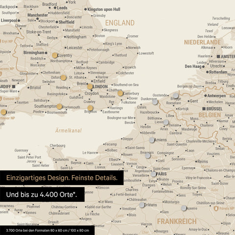 Ausschnitt einer magnetischen Europakarte in Gold zeigt einen Ausschnitt von England, Frankreich und Belgien mit Details wie Nationalparks, Flüssen und zahlreichen kleineren Orten und Städten