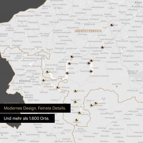 Ausschnitte einer Österreichkarte mit dem Salzkammergut und der Steiermark als Pinn-Leinwand in Dunkelgrau mit 1.600 Orten
