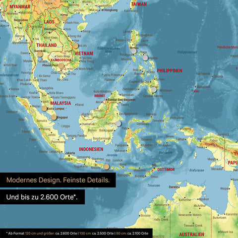 Ausschnitt einer magnetischen topografischen Weltkarte in Multicolor Topo zeigt Karte von Asien, auf der Magnete Reiseziele markieren
