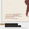 World map in Bordeaux red color with a printed quote from Anthony Bourdain, which can be replaced with any other quote during personalization